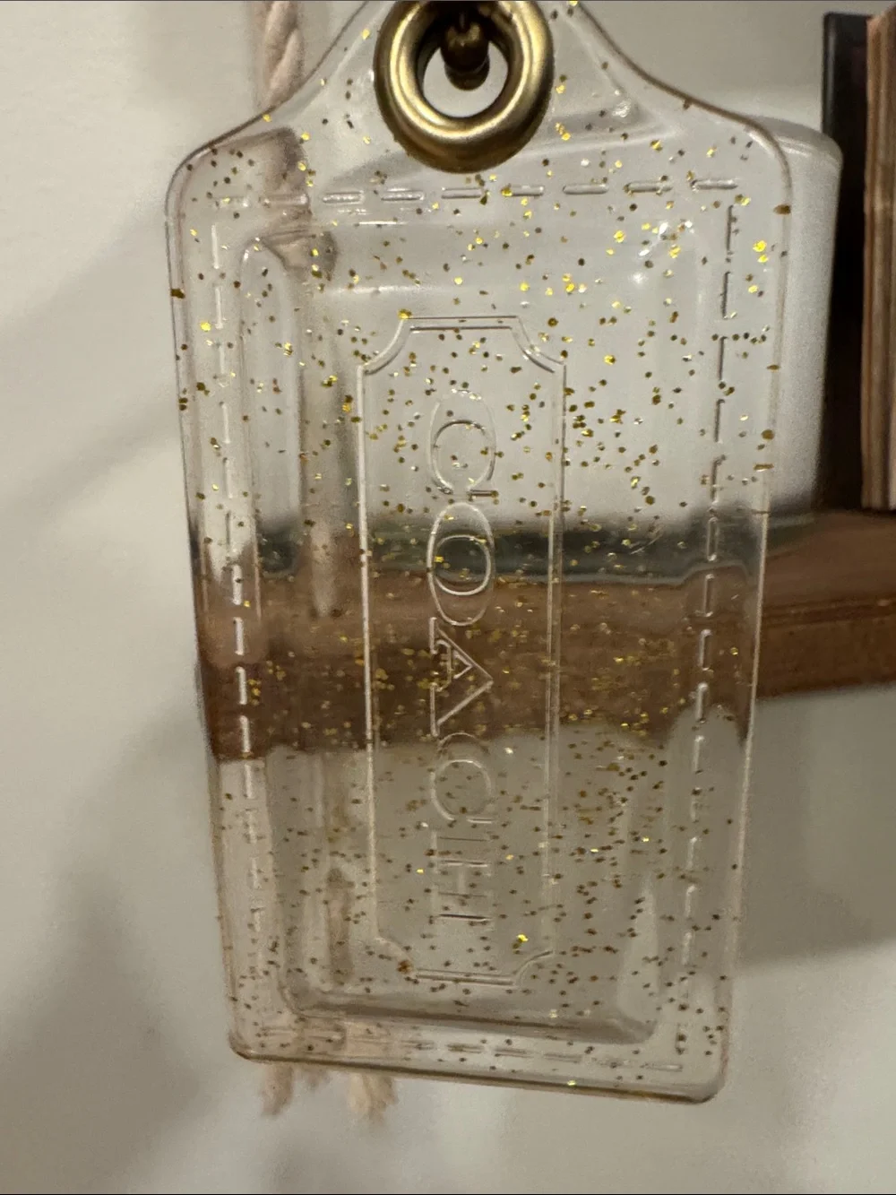 Coach Poppy Clear hangTag Keychain with Gold Glitter